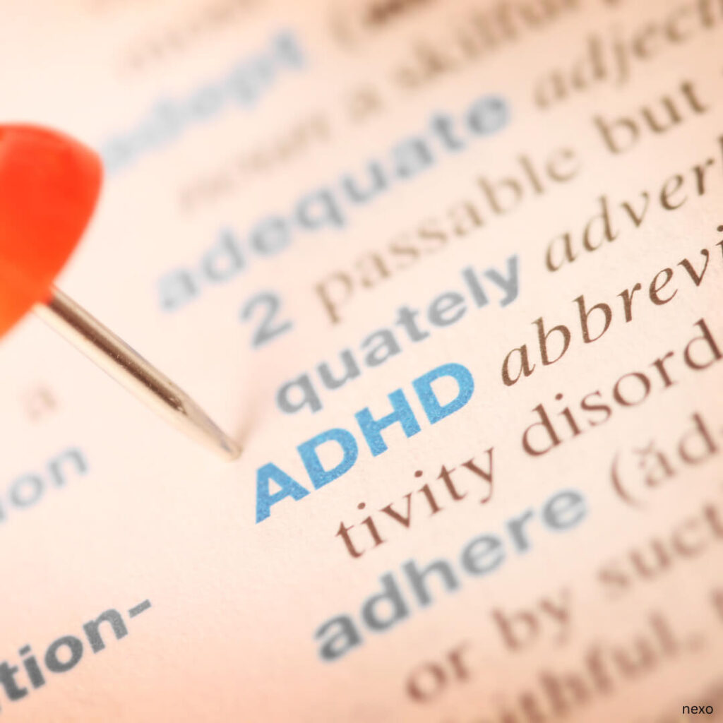 Types of adhd blog picture, with the word adhd pinned in a dictionary